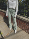 Editor's Note | Wide Leg Trousers // Model is 5'5" wearing a size Small  Features:  Wide Leg Woven Material Pocket Detail Seam Front Wide Leg